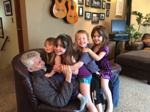 Four little monkeys jumping on Grampa!