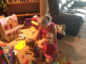 Gramma playing in Joel's walk-out basement with grandchildren